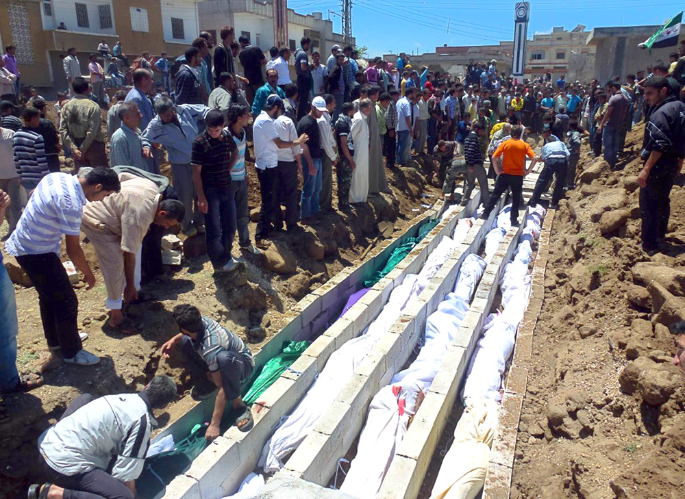 Burial of victims killed by Syrian forces in Houla, Syria