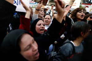 Whether in the public or private spheres, at the hands of state or non-state actors, violence against women in Egypt continues to go mostly unpunished (Photo Credit: Mahmud Khaled/AFP/Getty Images).