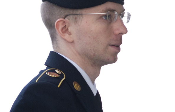 U.S. Army Private First Class Bradley Manning arrives at a U.S. military court facility to hear his sentence in his trial at Fort Meade, Maryland on August 21, 2013 (Photo Credit: Saul Loeb/AFP/Getty Images).