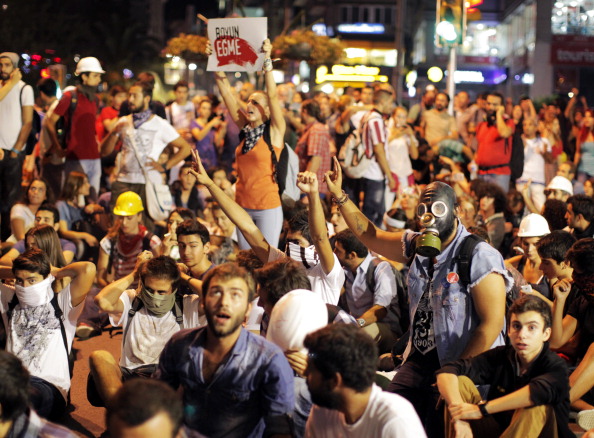 Protestors chant slogans on September 12, 2013 at Kadikoy in Istanbul (Photo Credit: Gurcan Ozturk/AFP/Getty Images).