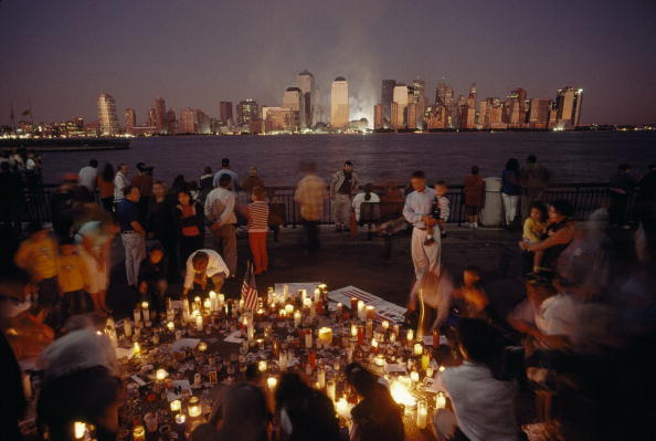 People at a candlelight vigil the night of September 12, 2001. New York City (Photo Credit: Lynn Johnson via Getty Images).