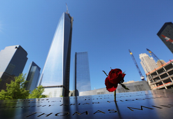 A rose stands at the 9/11 Memorial, New York City, May 16, 2013 (Photo Credit: Mario Tama via Getty Images).