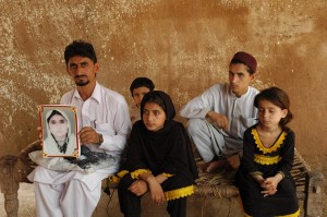 Nabeela Bibi (center) with her family after her grandmother's death. 