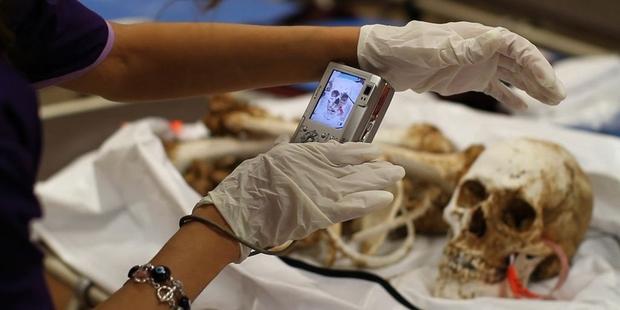 The Pima County Office of the Medical Examiner works to identify the corpses of the hundreds of men and women who perish each year in the Arizona desert (Photo Credit: www.marcsilver.net).