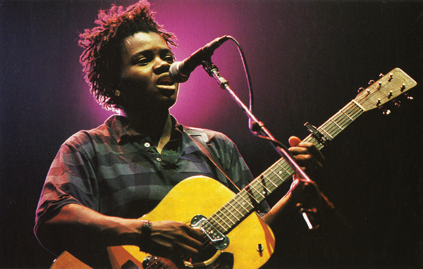  Tracy Chapman performing at the concert. The Human Rights Concert series featured musicians such as Sting, The Police, Peter Gabriel, U2, Bruce Springsteen, Radiohead, Joan Baez, and many others. Over 1,250,000 people around the world attended these concerts in person, and millions more experienced them on television and radio (Photo Credit: Ken Regan/Neal Preston for Amnesty International).
