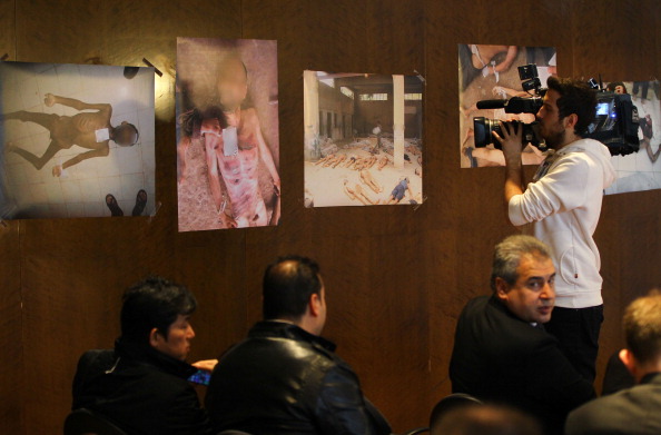 Syrian opponents hold a press conference about the newly published photos of Syria War Crime evidence in Montreux, Switzerland, on January 23, 2014 (Photo Credit: Evren Atalay/Anadolu Agency/Getty Images).