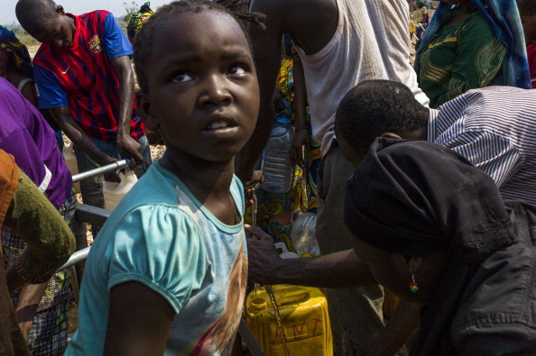 The Seleka coup plunged the country into chaos, unleashing a wave of Muslim-Christian violence that has left thousands dead. Hundreds of thousands of people have also been displaced by the brutal surge of killings, mutilations, rapes and looting (Photo Credit: Fred Dufour/AFP/Getty Images).
