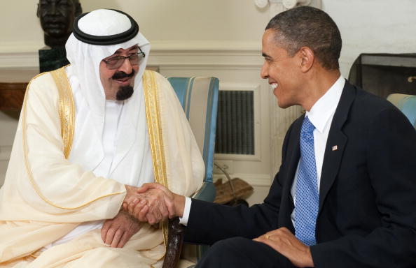 President Barack Obama shakes hands with King Abdullah bin Abdulaziz Al Saud of Saudi Arabia during meetings in the Oval Office at the White House on June 29, 2010 (Photo Credit: Saul Loeb/AFP/Getty Images).