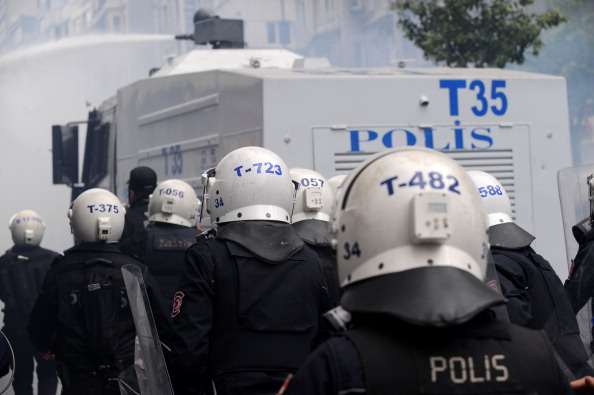 Turkish riot police use water cannons and tear gas to disperse protesters during a May Day demonstration on May 1, (Photo Credit: Burak Kara/Getty Images).
