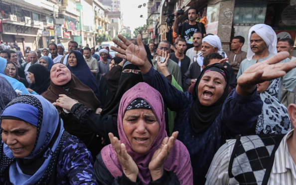 Relatives of the defendants react after an Egyptian court sentenced 638 Morsi backers to death in a mass trial in Egypt (Photo Credit: Ahmed Ismail/Anadolu Agency/Getty Images).