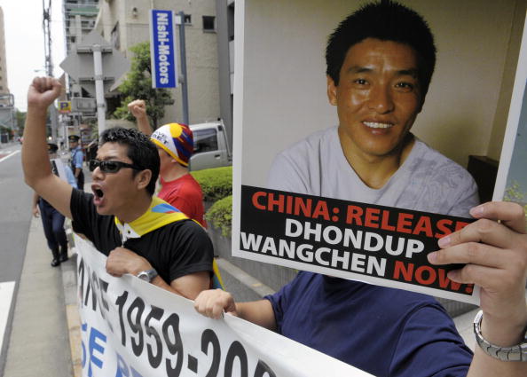 Protesters of 'Students for a Free Tibet Japan' shout slogans during a demonstration to demand the release of arrested Tibetan movie director Dhondup Wangchen in front of the Chinese embassy in Tokyo (Photo Credit: Toshifumi Kitamura/AFP/Getty Images).