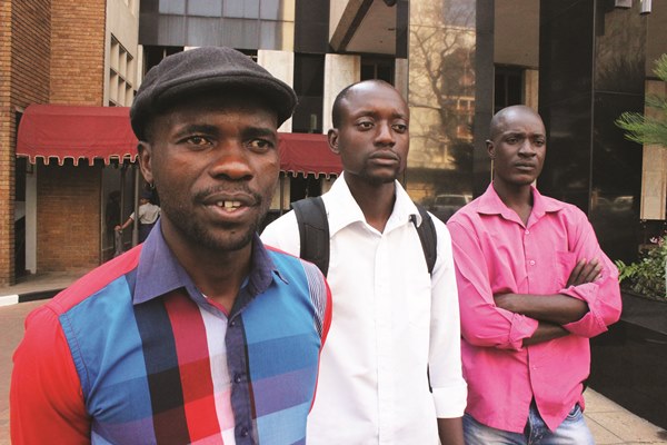 tai Dzamara (left) and fellow activists of the Occupy Africa Unity Square protest, have vowed to continue with their sit in until their demands are met by President Robert Mugabe. (Picture by Daily News)