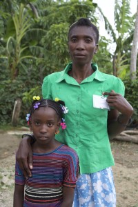 Susana, 9, with her mother. 23 June 2015, Dominican Republic