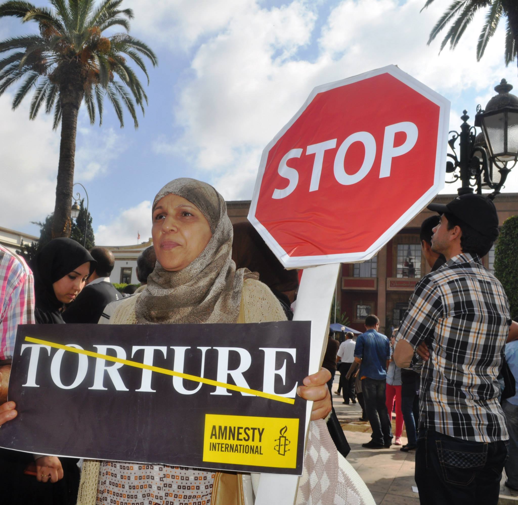 Some photos of some of AI Morocco actions on Stop Torture. Stop sign