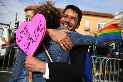Same-sex marriage supporter Stuart Gaffney hugs a friend while celebrating the U.S Supreme Court ruling regarding same-sex marriage. (Photo by Justin Sullivan/Getty Images)