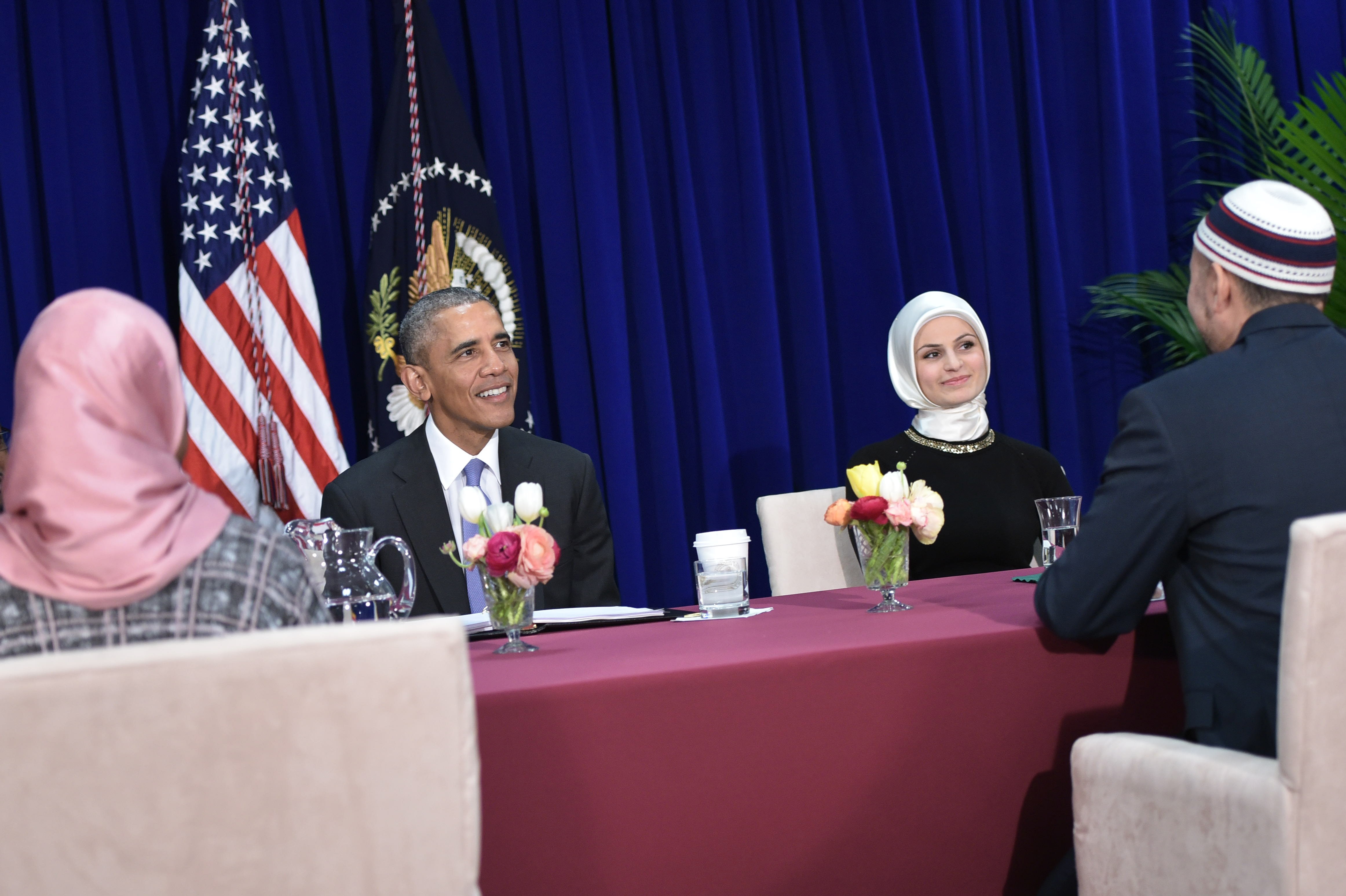US President Barack Obama participates in a roundtable discussion with members of the Muslim community while visiting the Islamic Society of Baltimore February 3, 2016 in Windsor Mill, Maryland.  Seven years into his presidency, Barack Obama made his first trip to an American mosque on February 4, offering a high-profile rebuttal of harsh Republican election-year rhetoric against Muslims.   / AFP / MANDEL NGAN        (Photo credit should read MANDEL NGAN/AFP/Getty Images)