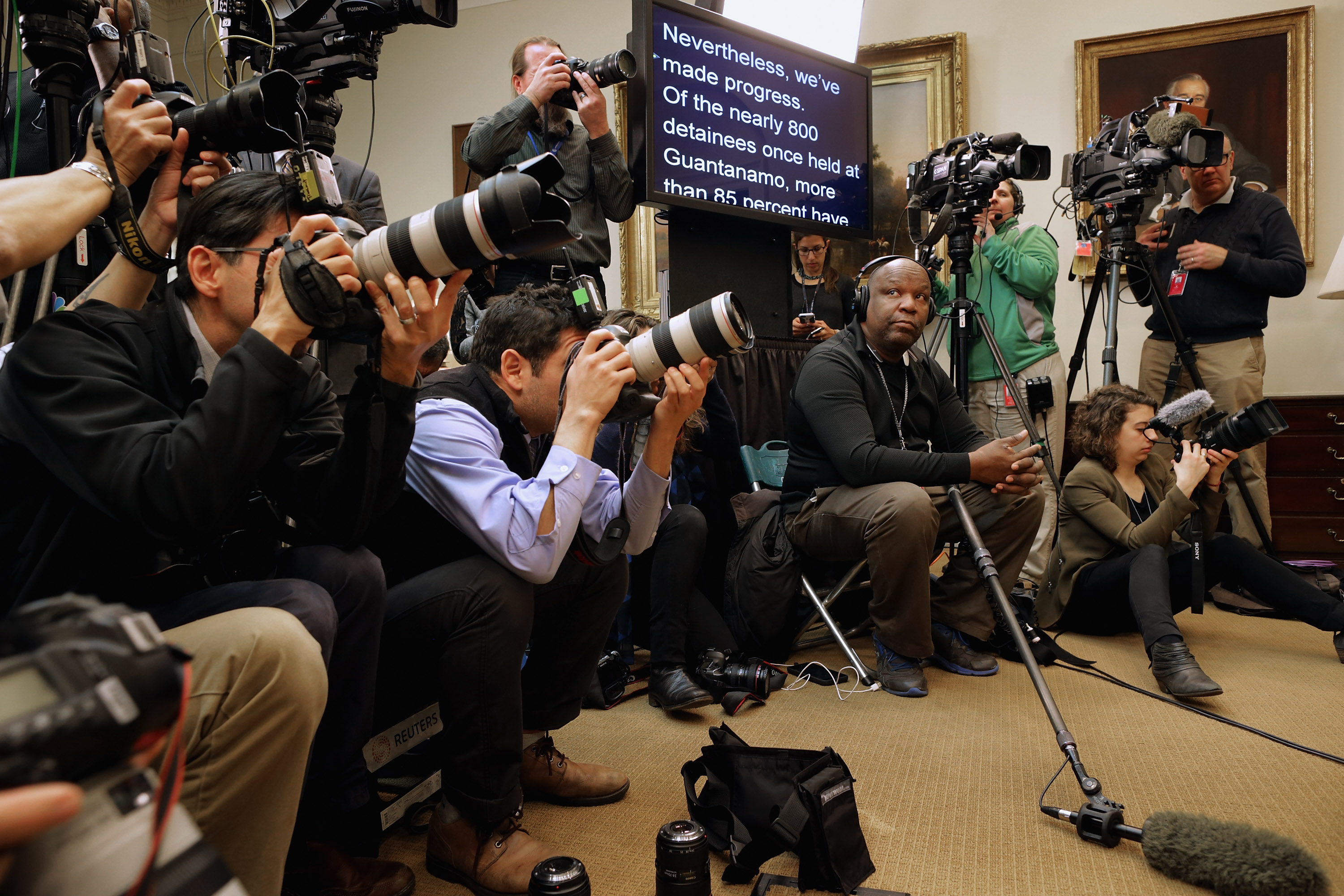 WASHINGTON, DC - FEBRUARY 23:  Journalists cover President Barack Obama making a statement about his plan to close the detention camp at the Guantanamo Bay Naval Base and relocate the terrorism suspects there to the United States in the Roosevelt Room at the White House February 23, 2016 in Washington, DC. Attempting to follow through with a campaign pledge he made in 2008, Obama will continue to face an uphill battle to close the prison in Cuba because of strong opposition to the plan by congressional Republicans.  (Photo by Chip Somodevilla/Getty Images)
