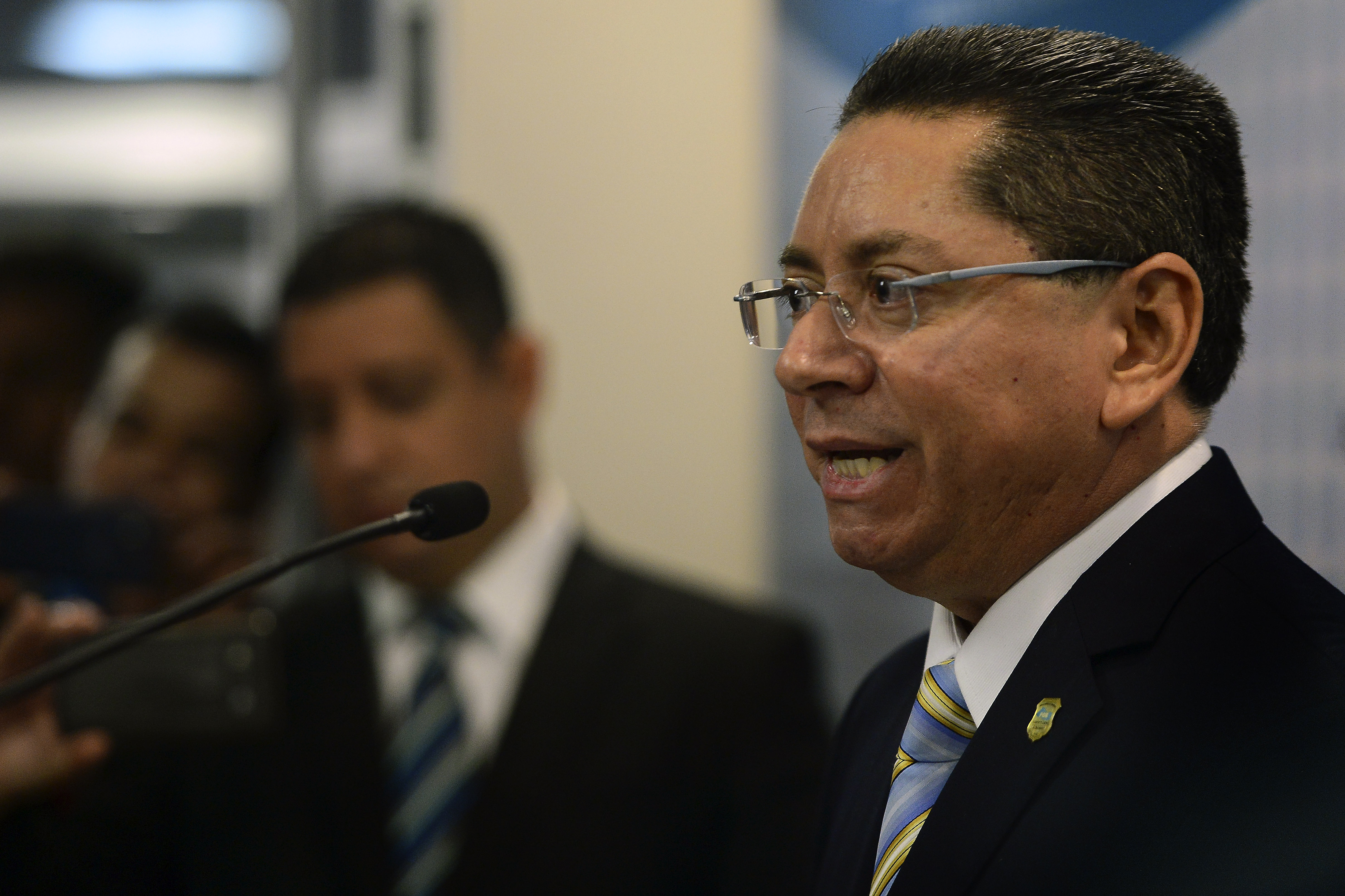 The new Prosecutor General of El Salvador, Douglas Arquimedes Melendez speaks during a press conference in San Salvador, on January 6, 2016. Melendez takes over as prosecutor general amid a social crisis provoked by an alarming increase in the number of murders, and which places Salvador as one of the most violent countries in Latin America.   AFP PHOTO / Marvin RECINOS / AFP / Marvin RECINOS        (Photo credit should read MARVIN RECINOS/AFP/Getty Images)