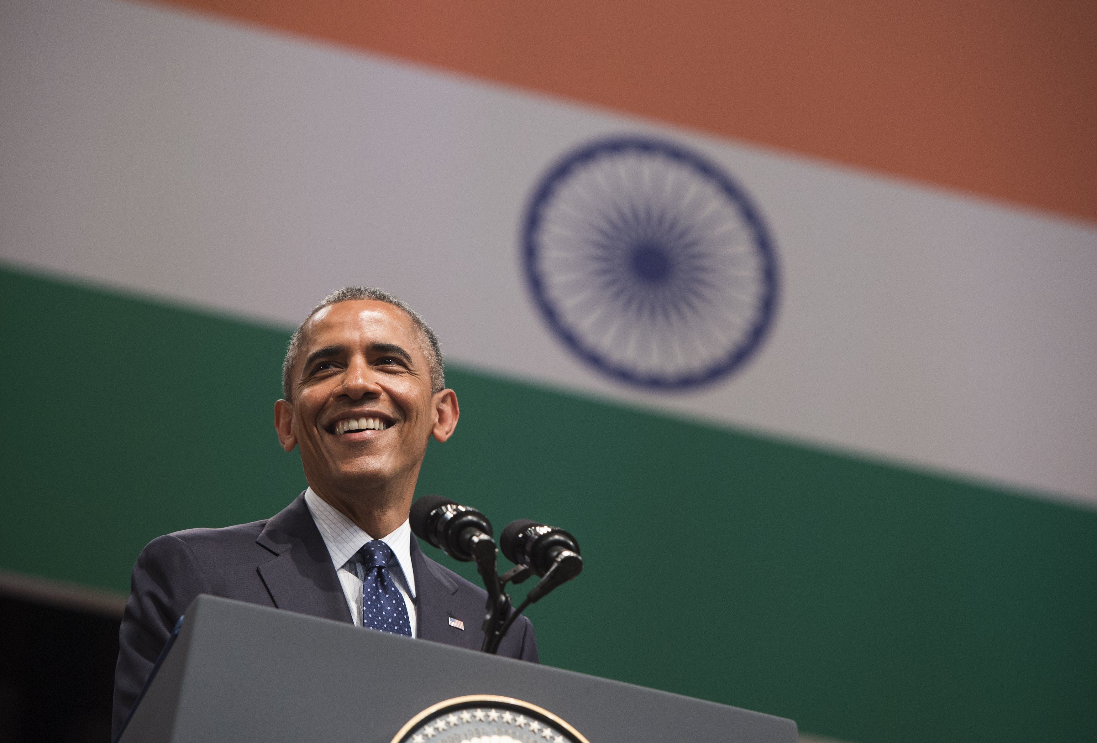 US President Barack Obama speaks on US - India relations during a townhall event at Siri Fort Auditorium in New Delhi on January 27, 2015. US President Barack Obama warned January 27 that the world does not &quot;stand a chance against climate change&quot; unless developing countries such as India reduce their dependence on fossil fuels. AFP PHOTO / SAUL LOEB        (Photo credit should read SAUL LOEB/AFP/Getty Images)
