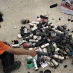 Bahraini boy with tear gas cannisters
