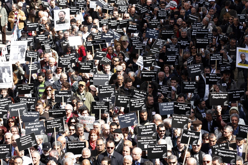 Journalists and activists participate in a rally for press freedom and against the detention of journalists under anti-terrorism laws in the capital of Ankara (Photo Credit: Ümit Bektas/Reuters). 