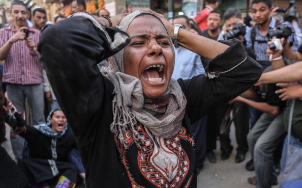 Egyptian defendants’ relatives mourn after Egypt court refers 638 Morsi supporters are sentenced to death sentence in the coutnry’s latest mass trial (Photo Credit: Ahmed Ismail/Anadolu Agency/Getty Images).