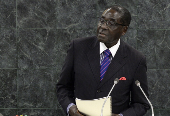 President Mugabe of Zimbabwe was not invited to the US-Africa summit happening this week, due to US sanctions, but the summit must keep Zimbabweans, many of whom have been suppressed and denied their basic human rights, in mind. (Photo Credit: Mike Segar-Pool/Getty Images)