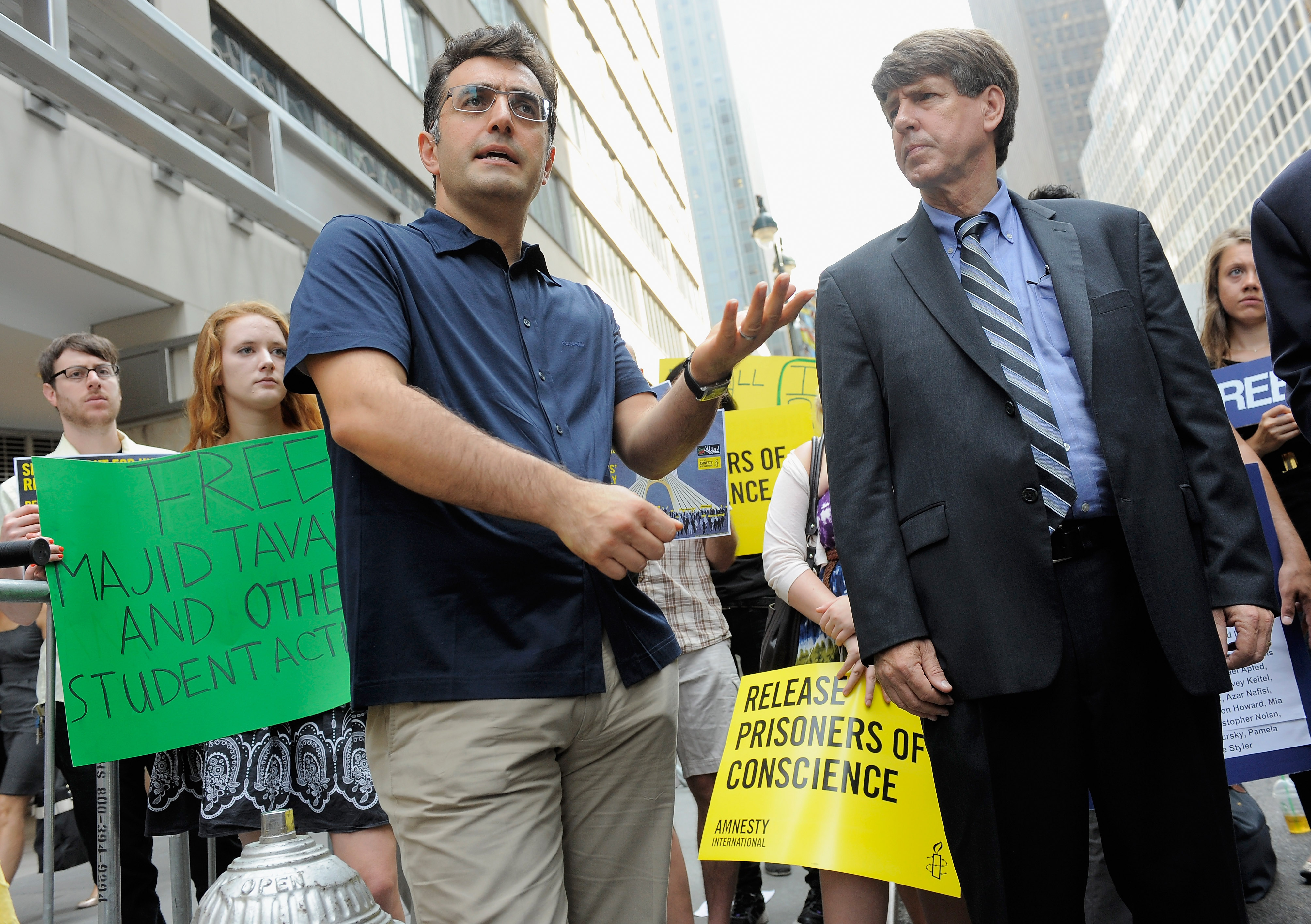 NEW YORK, NY - JUNE 08:  Journalist Maziar Bahari and Head of Amnesty International Larry Cox speak  during a rally calling for Iranian officials to reverse prison sentence of Jafar Panahi and Mohammad Rasoulof on June 8, 2011 in New York City.  (Photo by Jemal Countess/Getty Images)